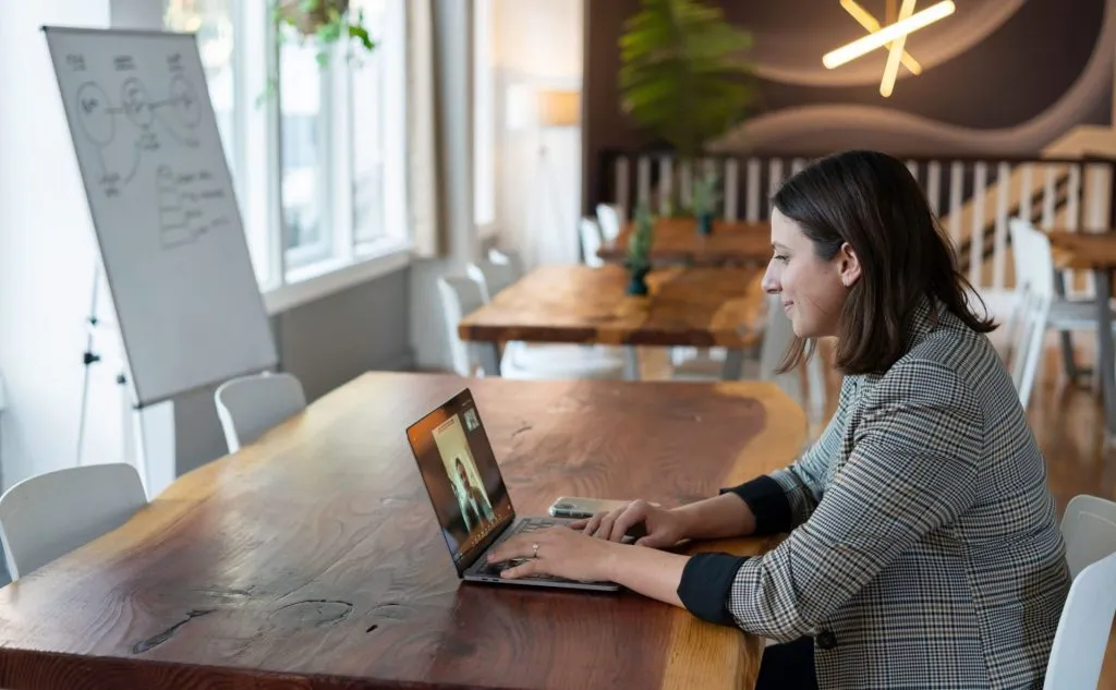 woman looking at a laptop hoping to be the Best Virtual Assistants for Accountants
